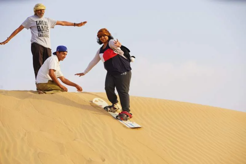 sand boarding experience in sunrise safari dubai